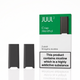Two JUUL 2 disposable vape devices shown next to their retail packaging on a white background. The packaging is green and white, labeled 'JUUL 2 Crisp Menthol' and includes a prominent nicotine warning label.